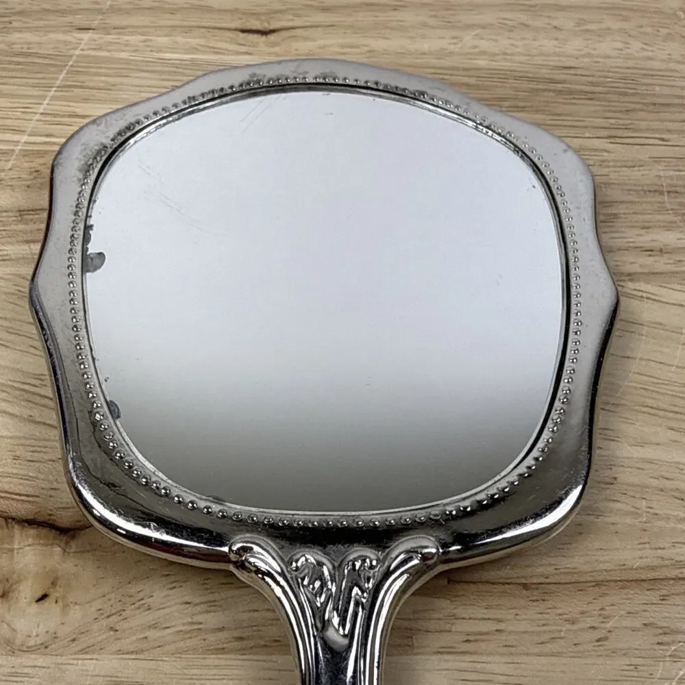 VINTAGE SILVERPLATE VICTORIAN STYLE VANITY HAND HELD MIRROR RAISED FLORAL DESIGN